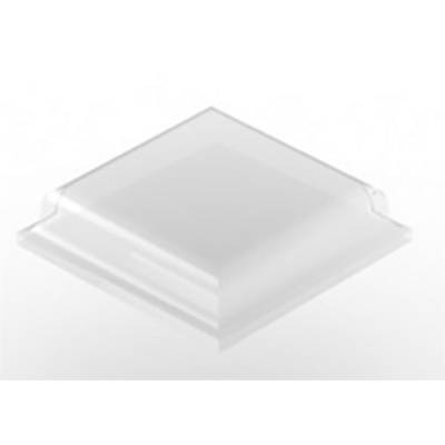 A transparent, square object with slightly rounded edges, resting on a white surface.