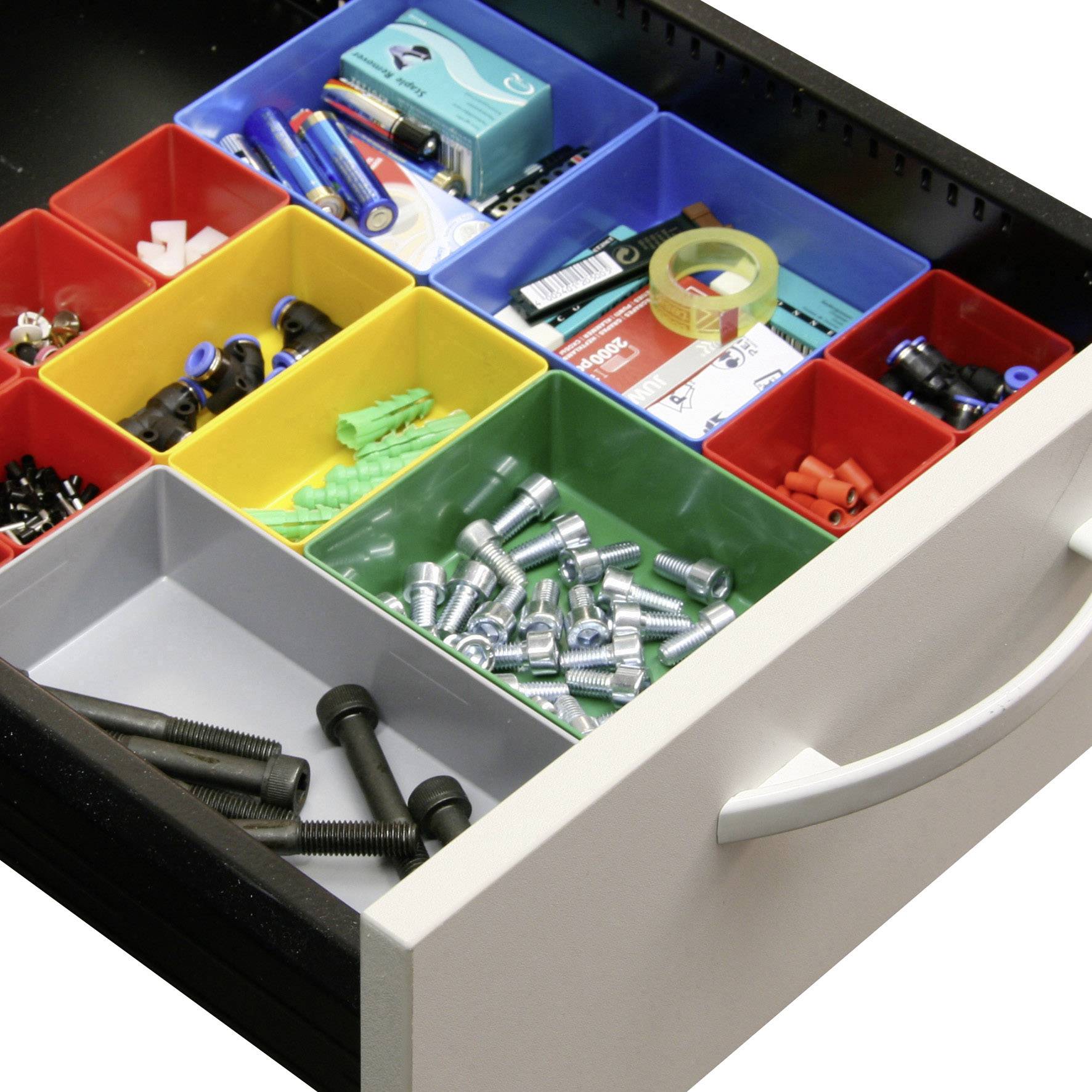 An open drawer with multiple compartments, sorted by colours, contains screws, batteries, adhesive tape and small parts.