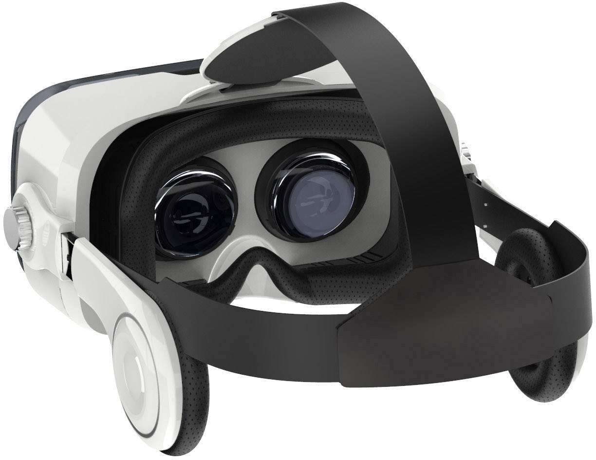 Virtual reality headset with a black headband and white casings, pictured from the front. It shows the lenses and the interior padding.