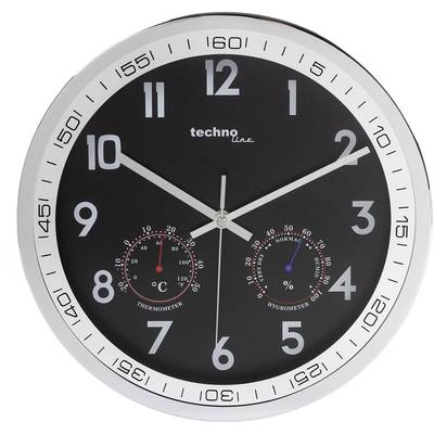 Round wall clock with a black dial, white numerals and three hands. Integrated thermometer and hygrometer displays.