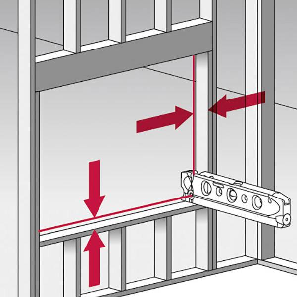 Diagram shows wall mounting bracket with red arrows indicating the direction and placement of screws for wall attachment.