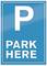 Blue sign with a large white letter 'P' above which reads 'PARK HERE', indicating a parking area.