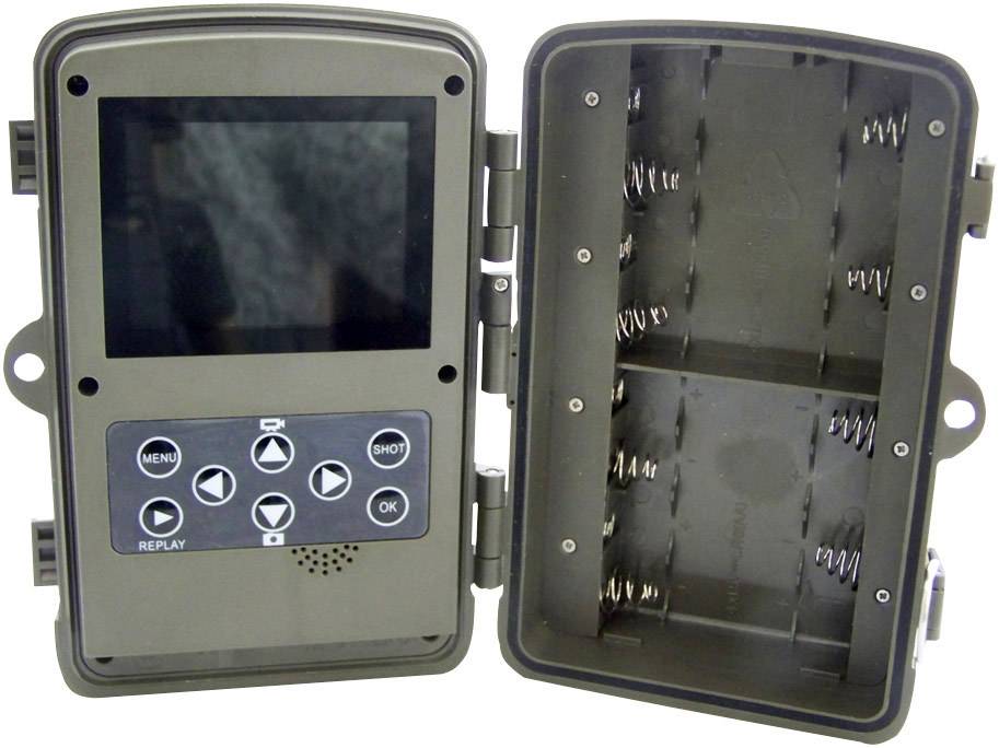 An opened, grey electronic device with a display on the left and battery compartment on the right; control buttons visible beneath the display.