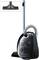 Vacuum cleaner with electric plug, hose and floor nozzle. The model has a black casing with silver elements.