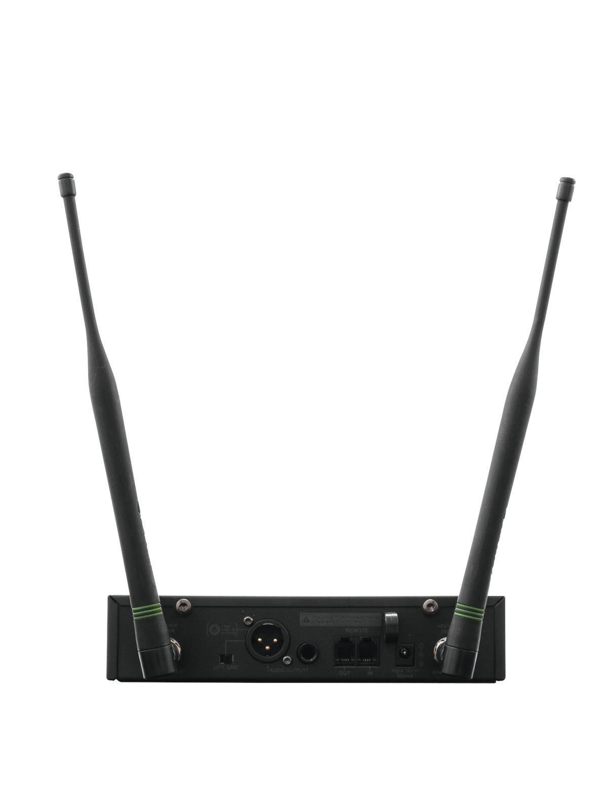 Black radio receiver with two long aerials. Shows back view with sockets for audio and power cables.