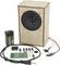Speaker kit with enclosure, cables, battery holder, and electronic components, including circuit board.