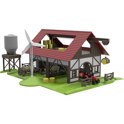 Model of a farmyard with a red-roofed barn, wind turbine, silo, tractor and bales. Sheep in an enclosure. Representation of sustainable agriculture.