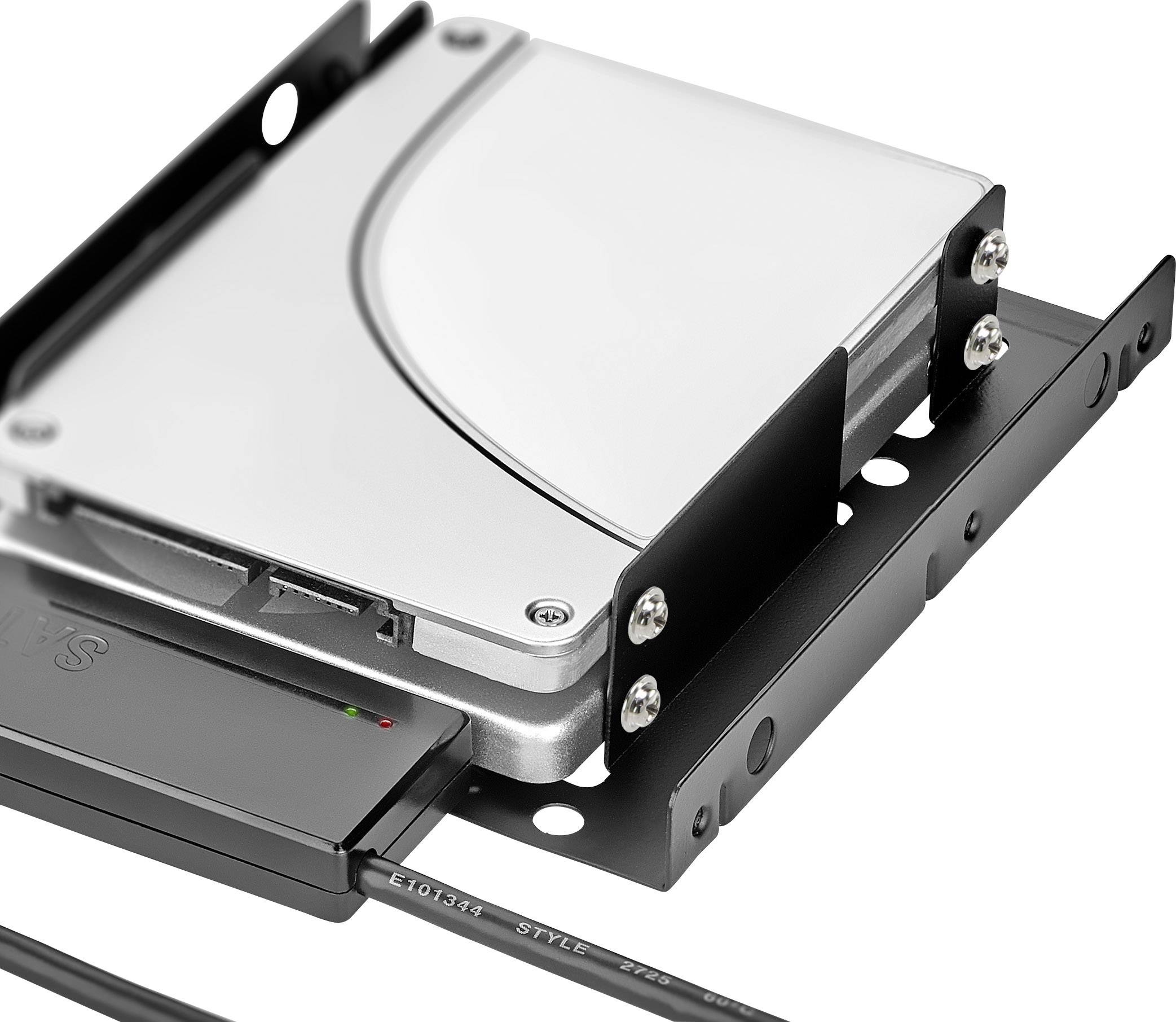 Hard drive in a black metal bracket, connected with a black cable.