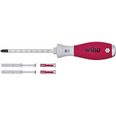 A screwdriver with a red and grey handle and two wall plugs, along with screws, are lying side by side.