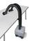 A downdraught extraction system with two flexible hoses and a container located beneath the table.