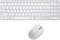 White wireless keyboard and mouse on white background.