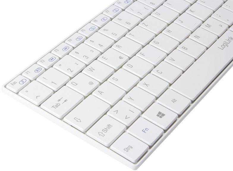 A white computer keyboard with a German layout; includes special keys such as 'Shift', 'Enter' and 'Fn'.