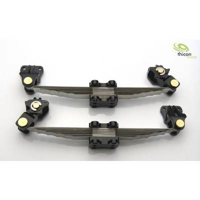 Two metal and plastic leaf spring suspensions with mounting elements, suitable for model-making applications.