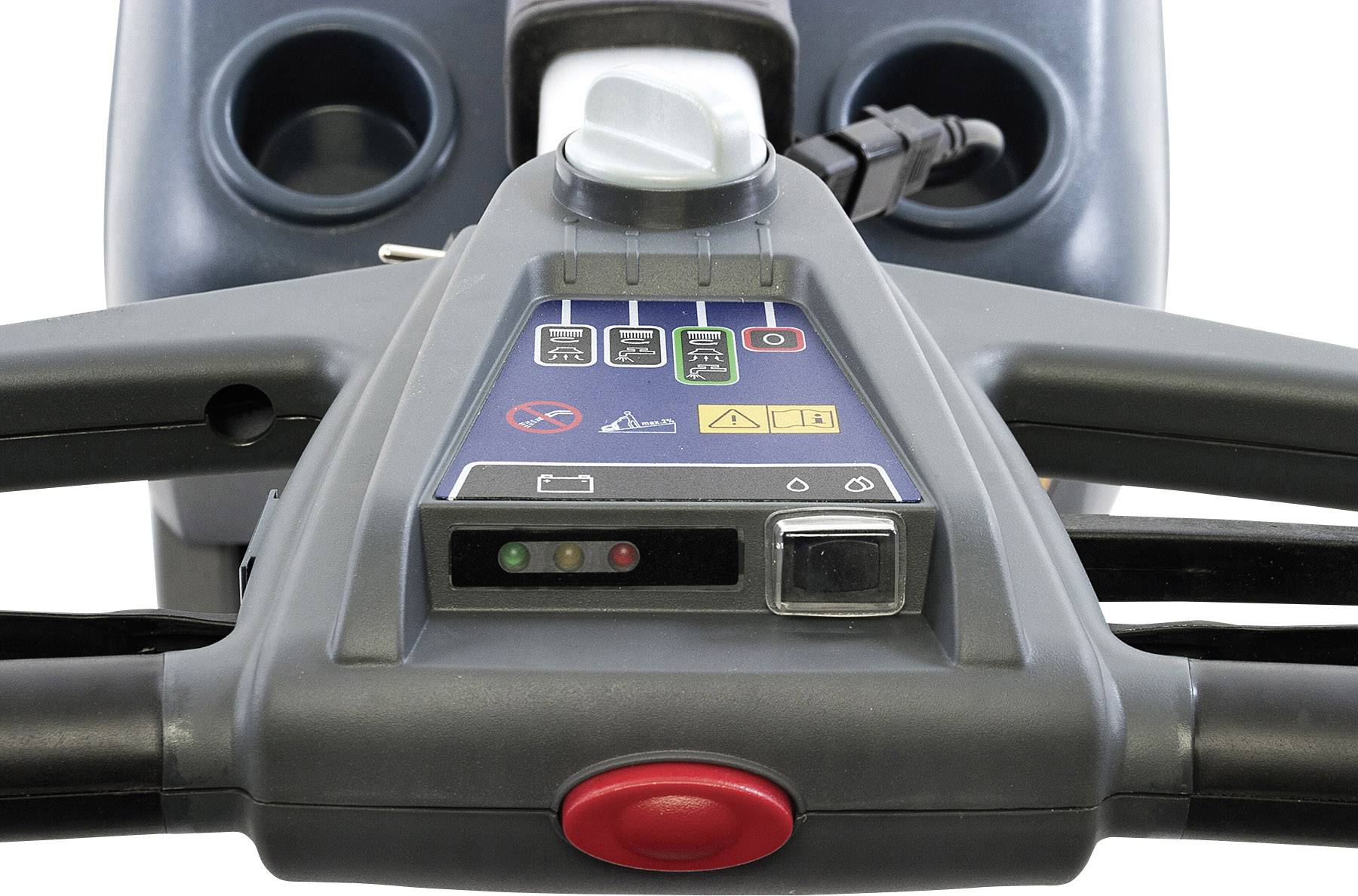 Close-up of a control panel with various buttons and symbols, likely for operating a device, featuring an emergency stop button.