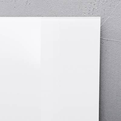 A light grey folder with the inscription 'Cachet Division' lies on a pale concrete floor.
