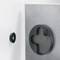 Large, cross-shaped magnetic holder on a door or wall, with a smaller magnetic plate beside it. Used for mounting and secure storage.