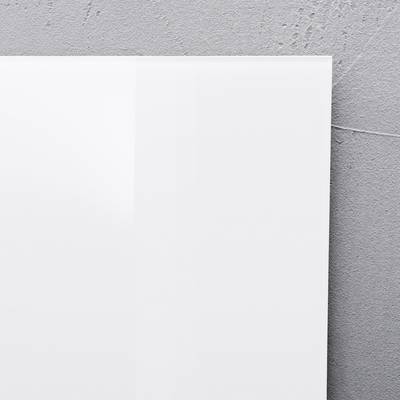 White wall on grey concrete background.