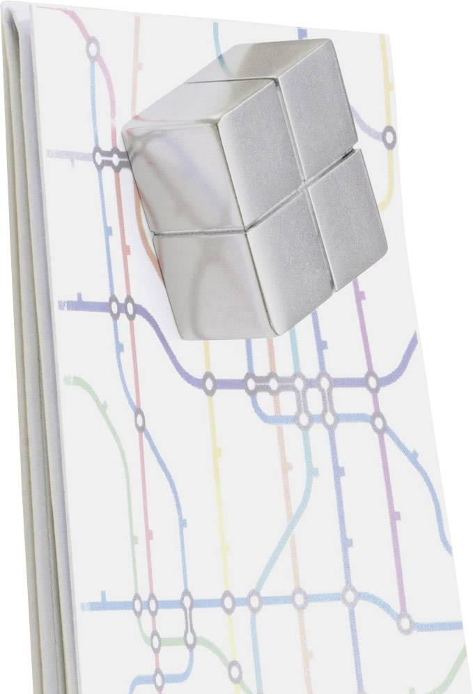 A silver cube hovers above a map with colourful lines representing a metro network.