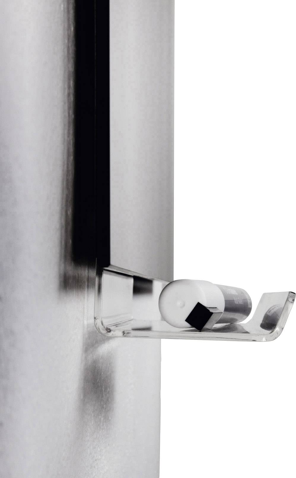 A transparent holder with a black pen is attached to a metallic board.