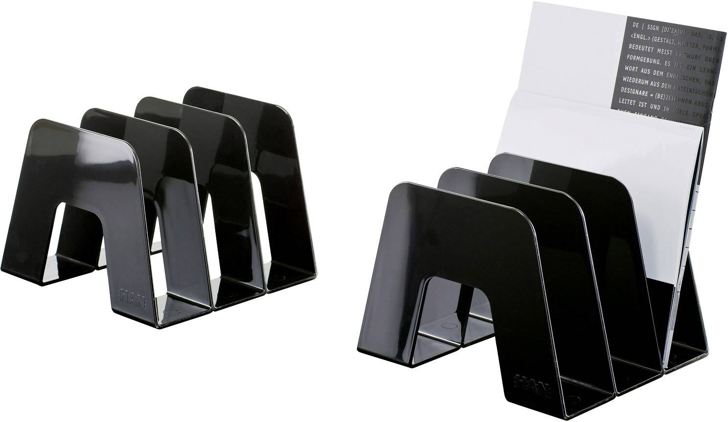 Black magazine holder with four compartments, filled with a calendar sheet on the right side.