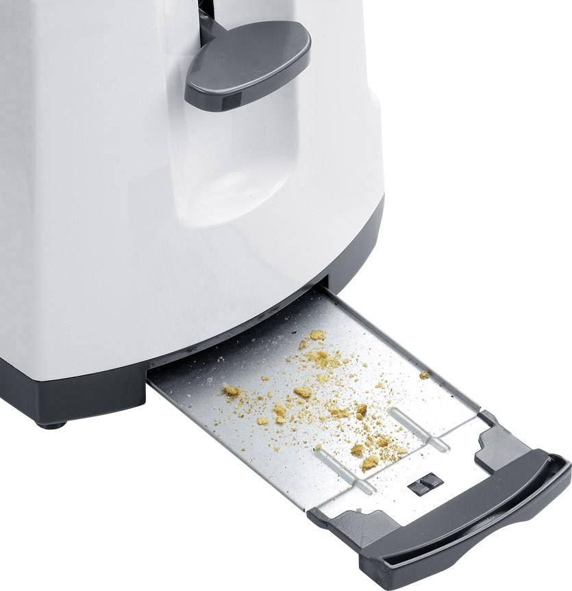 A toaster with a pulled-out crumb tray containing some breadcrumbs. This demonstrates the function of collecting and removing crumbs.