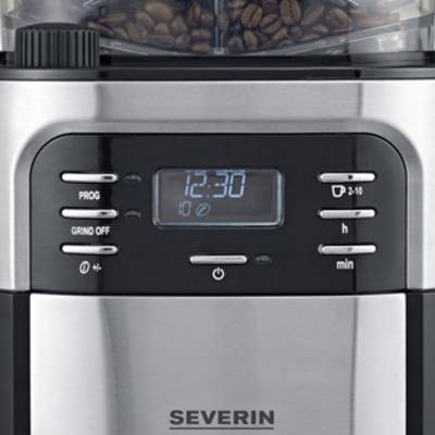 Filter coffee machine with built-in grinder. LCD display shows time, buttons for programming and grind settings. Coffee beans visible on top.
