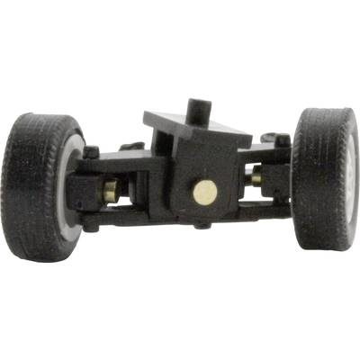 Close-up of a black model chassis with four wheels, forming the base of a small vehicle.
