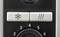 Console with icons of snowflakes and steam next to a dial with numbers three to six.