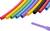 Multicoloured heat-shrink tubes in a curved arrangement on a white background, with a single purple tube lying separately.