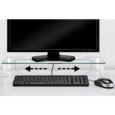 A computer screen sits on a glass stand above a keyboard. Arrows indicate to the left and right beneath the screen that space is being created for the keyboard.