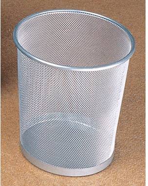 An empty, silver wastepaper bin made of metal mesh stands on a brown carpet.