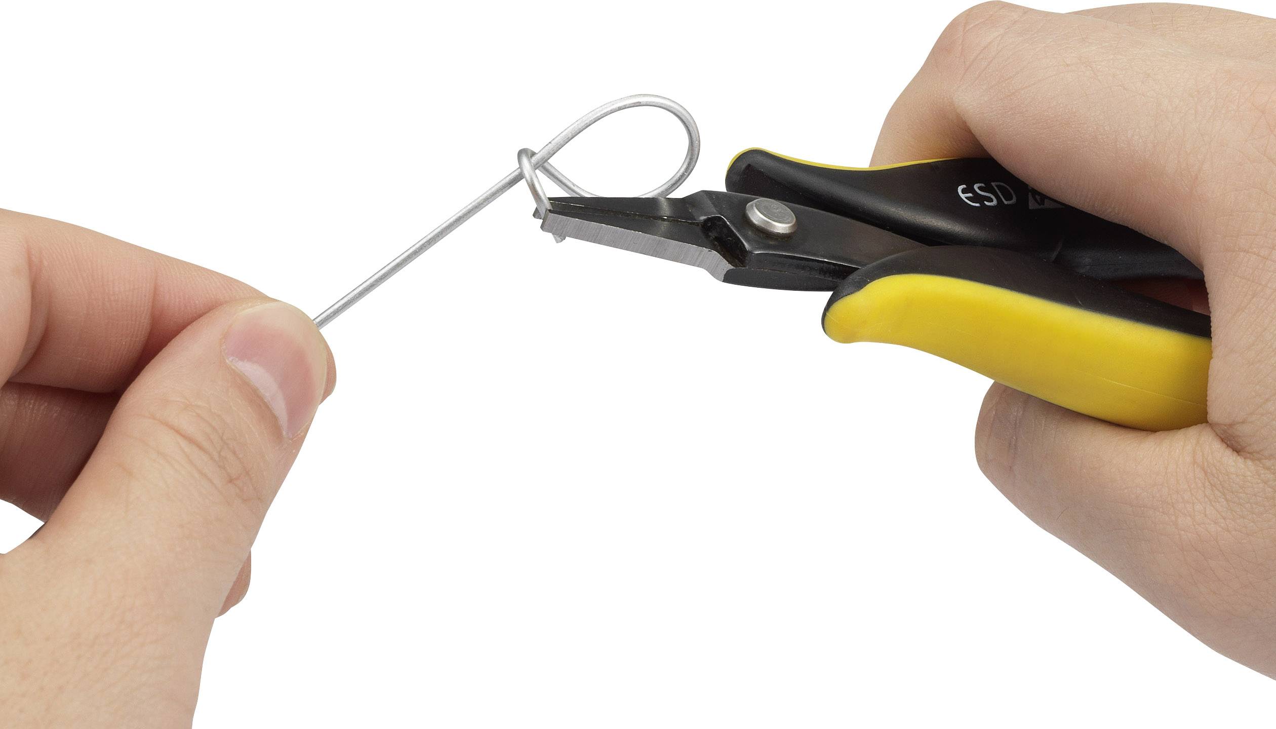 Two hands are bending a wire with a small pair of pliers. One hand is holding the wire, while the other is guiding the pliers.