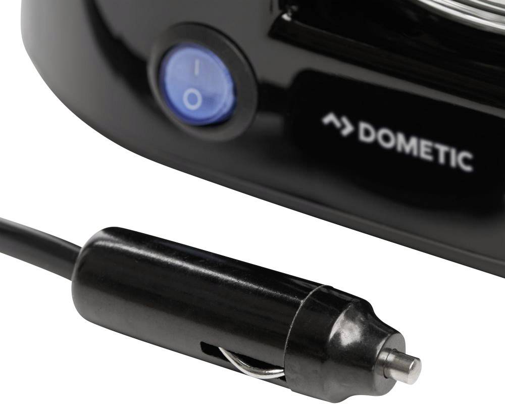 Close-up of a car socket and power cable with a blue on/off switch. 'Dometic' marking visible.