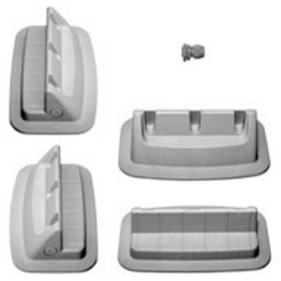 Plastic parts of various shapes and sizes, some with recesses, arranged beside a small, round component.
