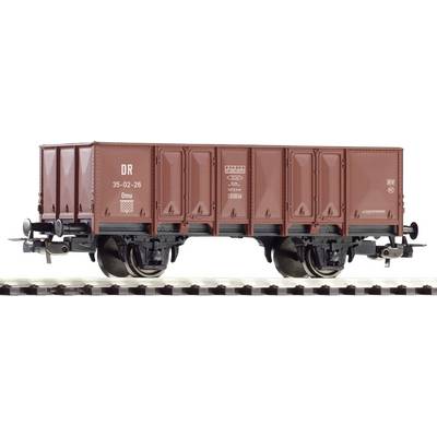 A brown goods wagon with the inscription 'DR 35-02-26'. The wagon is standing on a track and has closed doors.