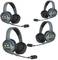 Four wireless headsets with microphones that can be used for team communication.