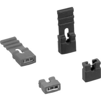 Four black jumper caps in various sizes on a white background. They are used for configuring circuits.