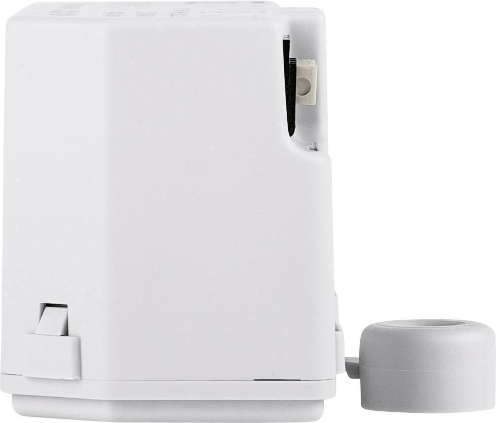 A white plastic electric pencil sharpener, compact and square in shape, with a side connection for a power cable.
