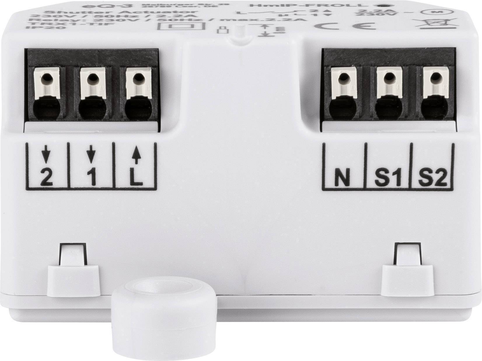 White electrical module with multiple terminal blocks labelled with numbers and letters for various circuits.