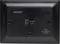 'Reverse side of a digital photo frame by Denver, model PFF-1010BLACK, with control label and CE marking.'