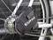Bicycle bag by EUFAB attached to the frame of a white bicycle, near the rear wheel and bicycle chain.