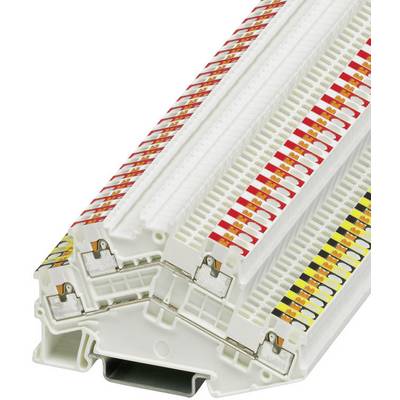 A stack of white patch panels with coloured markings on the top surface, used for cable management in telecommunications systems.