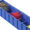 Blue organiser with compartments, filled with screws and red wall plugs.