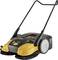 Hand-guided sweeping machine with a yellow and black casing, two rotating brushes and large rear wheels.