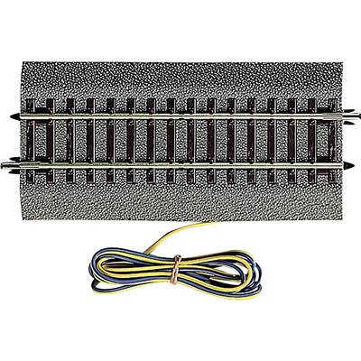 Section of model railway track, with bundled, coloured cables for power supply.