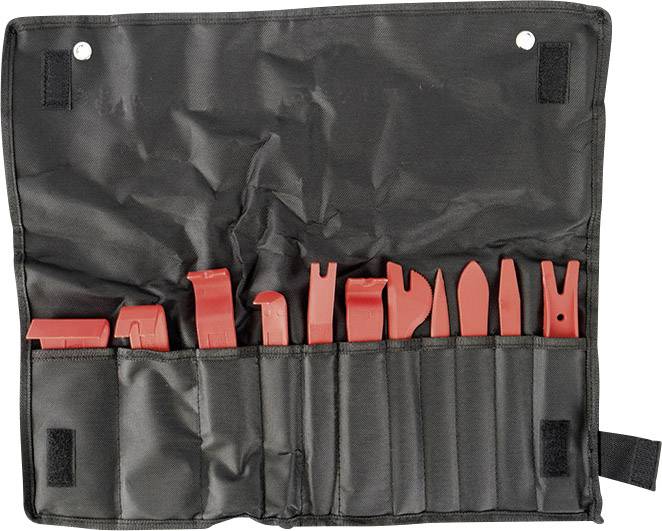 An opened, black tool case containing red plastic tools of various shapes and sizes, arranged in separate compartments.