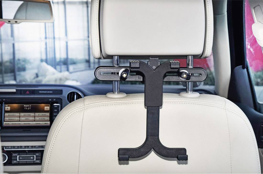 Tablet headrest mount attached to a car seat, ideal for hands-free activities whilst driving.