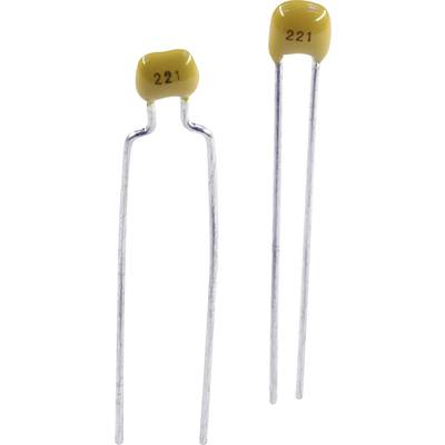 Two yellow ceramic capacitors with the marking '221' are standing upright. They have long metallic connecting wires.