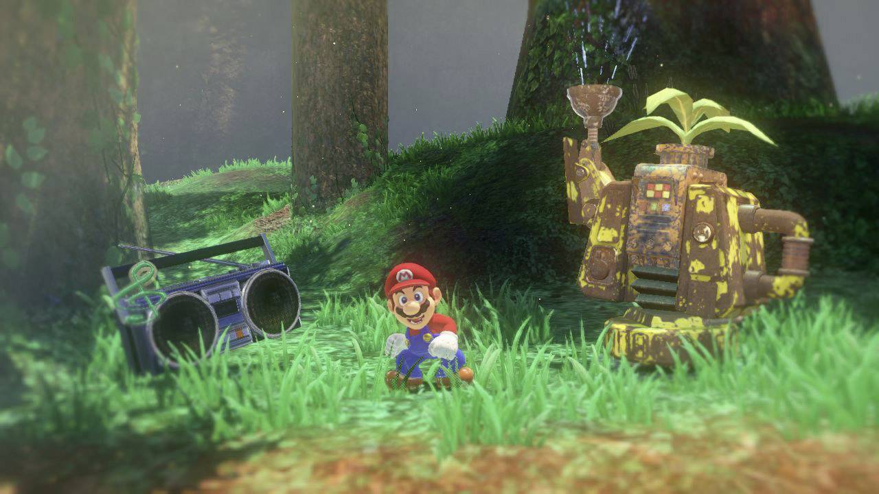 A game character in red clothing sits smiling on a forest clearing next to a radio and a large plant in a mechanical container.