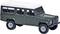 A green toy model of an off-road vehicle with a white roof and four doors, sitting on a flat surface.